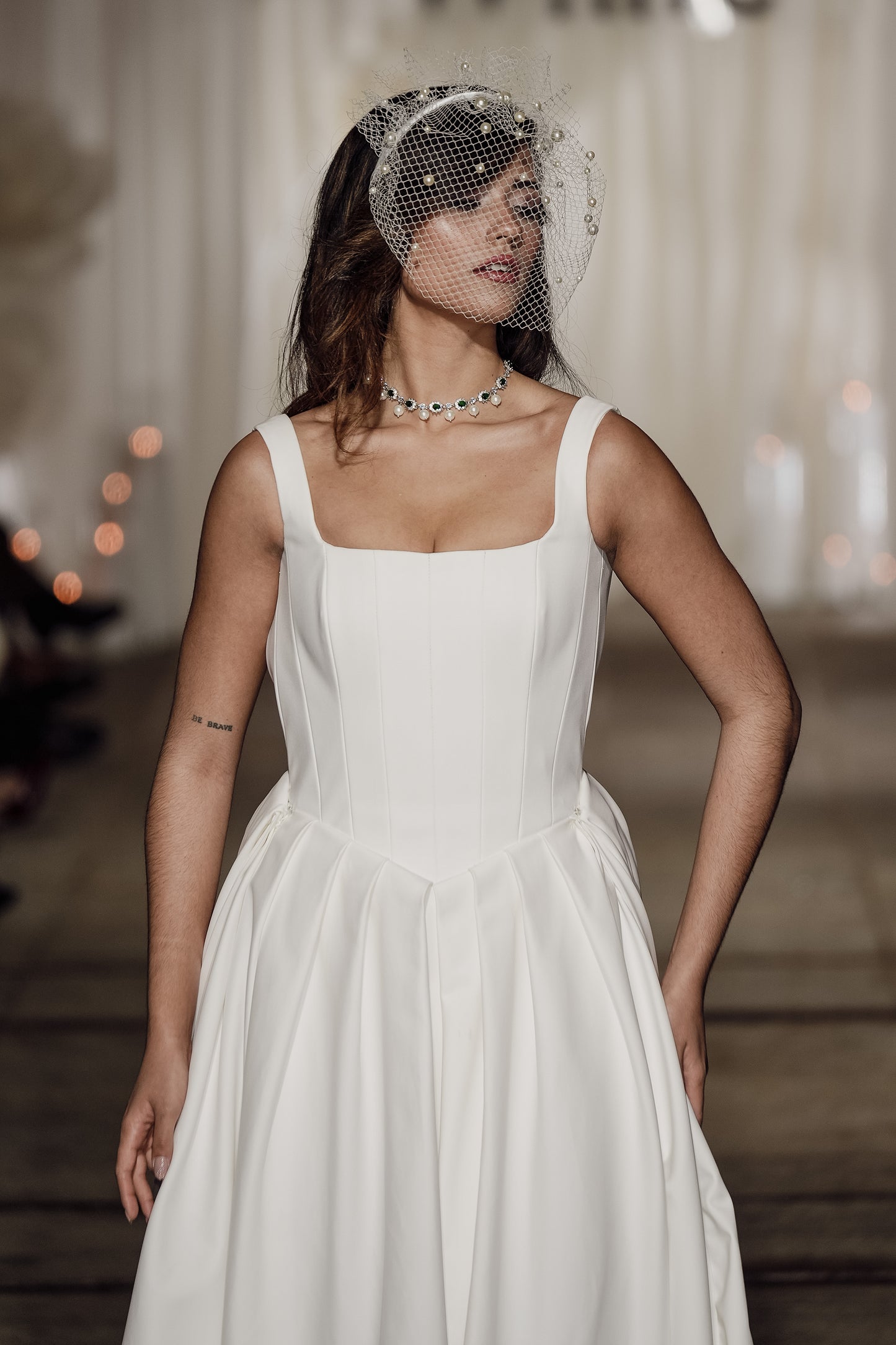 carlota wearing riviere verte collier in couture by Bitar atelier