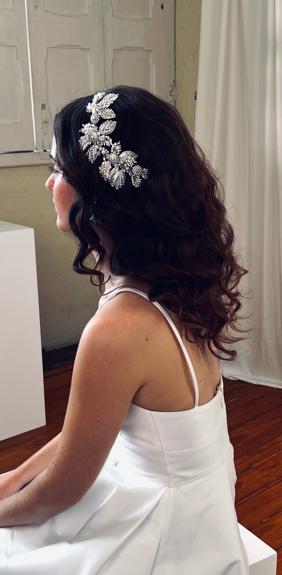 Headpiece placed on model with pearls and strass