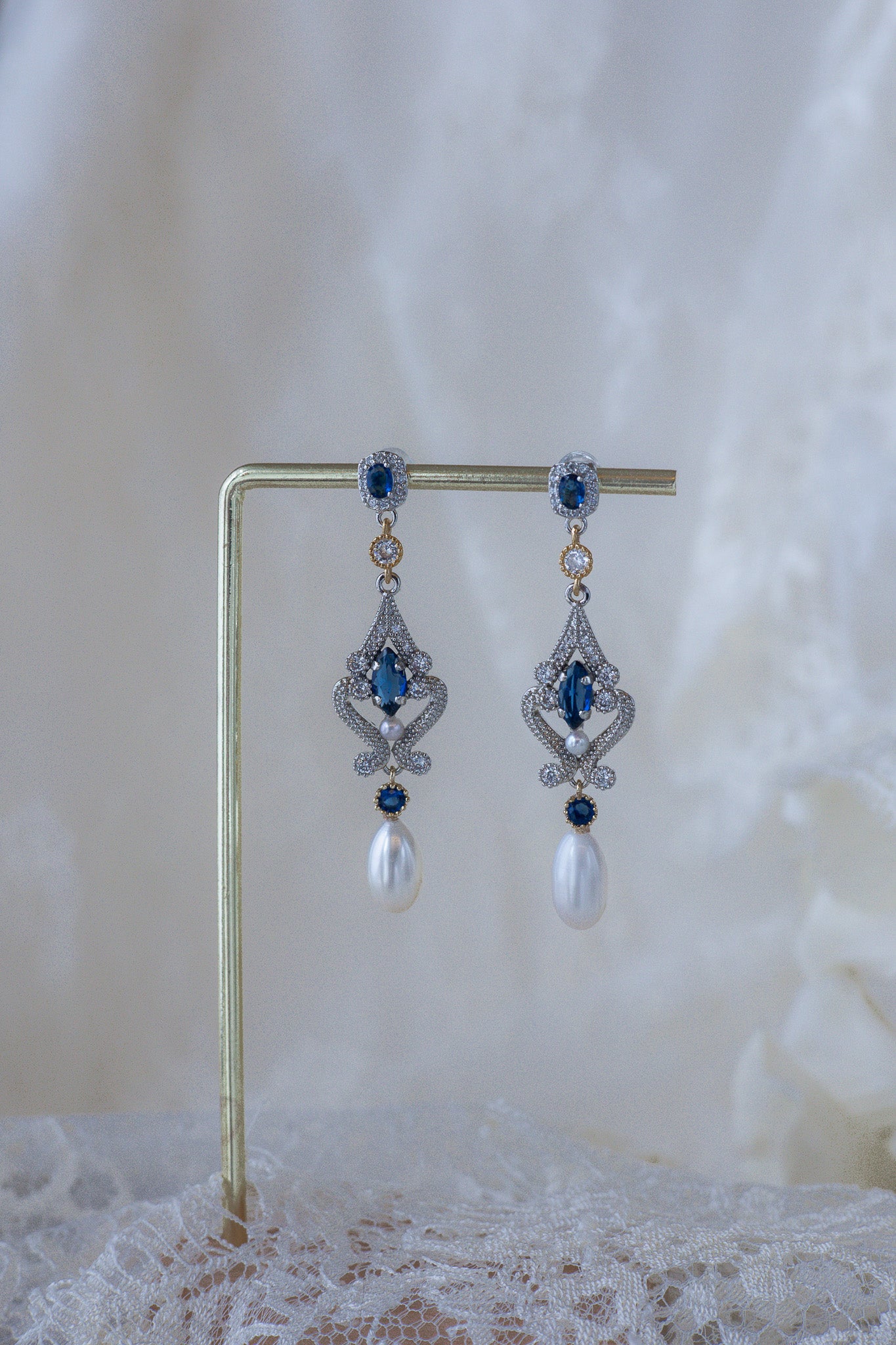 vintage inspired earrings with blue stones and pearls